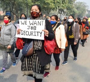 Group of workers standing together advocating for workers' rights